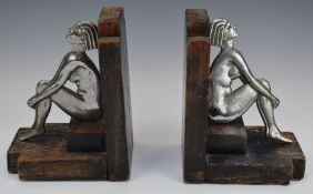 Pair of Art Deco wooden bookends with chrome figures, H15cm