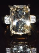 A 9k gold ring set with idocrase and diamonds, size N, 7.2g