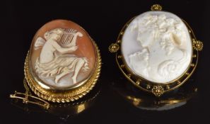 A 9ct gold brooch set with a cameo depicting a lady playing the harp and a Victorian brooch set with