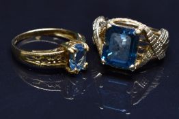 Two 9ct gold rings set with topaz, size N, 9.6g