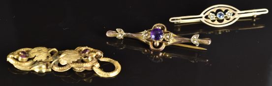 Two Edwardian 9ct gold brooches set with an amethyst and seed pearls (4.8g) and a section of an