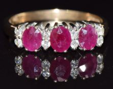 A 9ct gold ring set with rubies and diamonds, size P, 2.6g