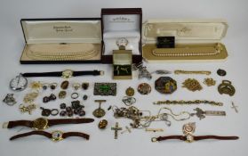 A collection of jewellery including Rotary watch, vintage brooches, necklaces, silver ingot,