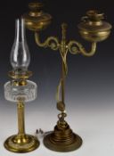 Twin branch brass oil lamp converted to electricity and a brass oil lamp, tallest 68cm