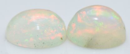 Two loose oval opal cabochons, total approximately 1.52cts