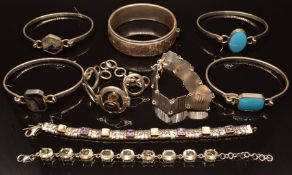 Five silver bangles and four silver bracelets set with quartz