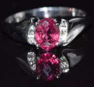 A 9k white gold ring set with rubellite and diamonds, size M, 2.2g