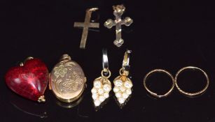 A 9ct gold locket, two 9ct gold crosses, enamel heart pendant with 9ct gold fittings and a pair of