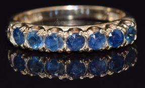A 9ct gold half eternity ring set with sapphires, size O, 2.5g