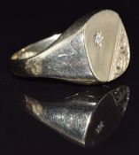 A 9ct gold rings set with a diamond, size S/T, 4.8g