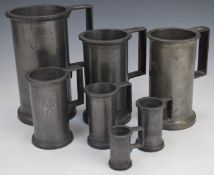 Seven graduated pewter tankards, smallest 5cm - tallest 18cm
