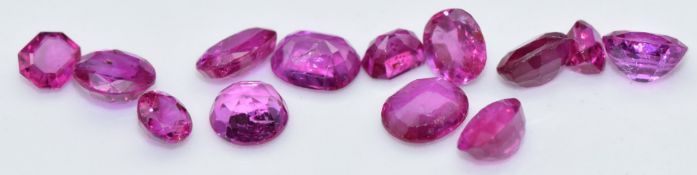 Thirteen loose cushion, round, octagonal cut natural unheated Burmese rubies, total carat weight