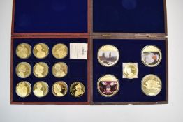 Two cased proof coin sets comprising 'Portraits of a Queen' commemorative 50mm and 70mm gold