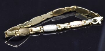 A 14ct gold tri-coloured bracelet, 5.5g