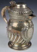 Victorian hallmarked silver presentation lidded jug, with ivory insulated scrolling handle and
