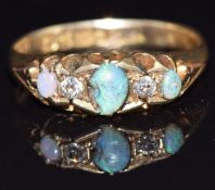 An 18ct gold ring set with opals and diamonds, Chester 1905, size M, 3g