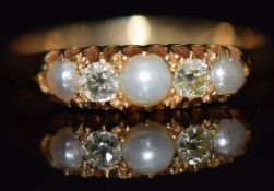 Edwardian 18ct gold ring set with old cut diamonds and pearls in vintage heart shaped box, size P,