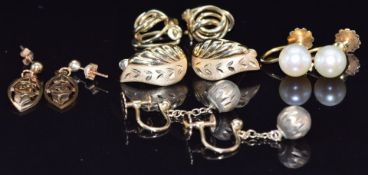 Five pairs of 9ct gold earrings including one pair set with pearls, 9.5g