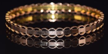 A c1925 9ct rose gold flapper bangle, 11.3g