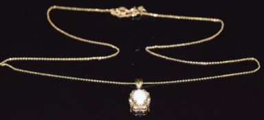 A 9ct gold pendant set with an oval opal cabochon, on 9ct gold chain, 1.7g