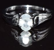 A 9k white gold ring set with prehnite, size M, 2.7g