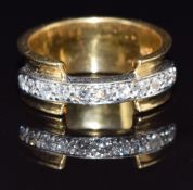 An 18ct gold ring set with diamonds, size P, 7.3g