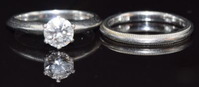 Tiffany & Co platinum ring set with a diamond of approximately 0.69ct with matching Tiffany & Co