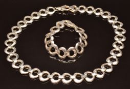 A silver necklace and matching bracelet, 93g
