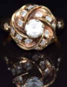 A 14k gold knot ring set with paste, size G, 4.9g