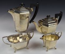 George V hallmarked silver four piece tea set of octagonal form, each pieced raised on four feet,