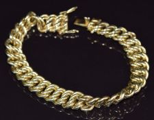 A 14k gold triple curb link bracelet, 31.1g