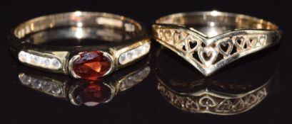 A 9ct gold ring set with cubic zirconia and a 9ct gold ring, size O and N, 3.7g