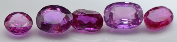 Five loose round and cushion cut natural unheated Burmese rubies, total carat weight approximately