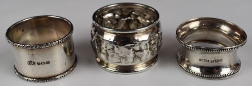 Three hallmarked silver napkin rings including an Elkington example, weight 63g