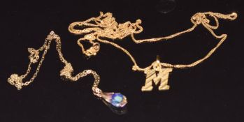 A 22ct gold chain and 22ct gold 'M' pendant (4.4g) and a 9ct gold chain, 0.3g