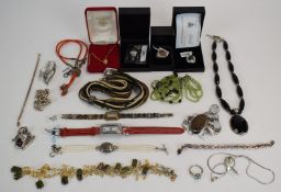 A collection of silver jewellery including rings, pendants, bracelets, silver watch, etc