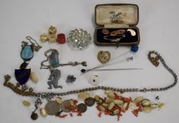 A collection of costume jewellery including 9ct gold cufflinks (5.3g), 9ct gold brooch set with