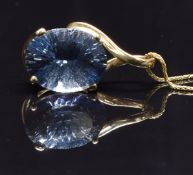 A 14k gold pendant set with a fancy oval cut tanzanite, on 14k gold chain, 6g