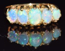 Edwardian 18ct gold ring set with opals, Birmingham 1909, size K, 3.3g