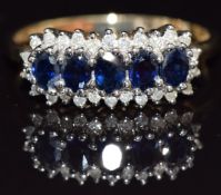 A 9ct gold ring set with oval cut sapphires and diamonds, size T, 3.1g