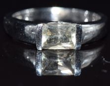 A 9k white gold ring set with a topaz, size N, 4.6g