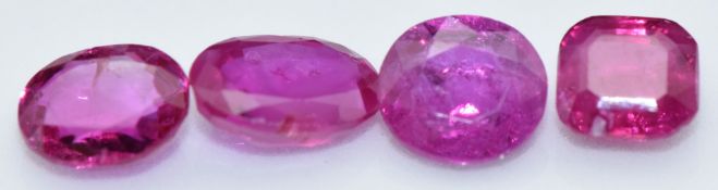 Three oval cut natural unheated Burmese rubies and a stepped square cut ruby, total carat weight