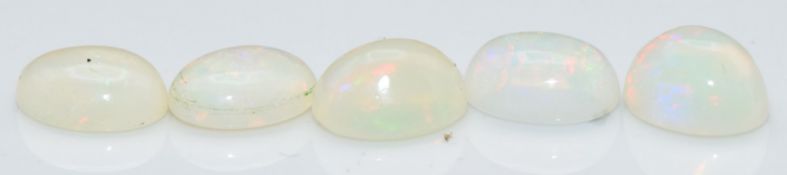 Five loose oval opal cabochons measuring approximately 4.15cts