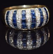 An 18ct gold ring set with diamonds and sapphires, size N, 6g