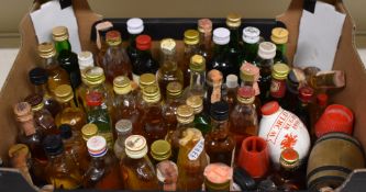 A collection of mainly whisky miniatures including Hundred Piper, Johnnie Walker Red Label, Canadian