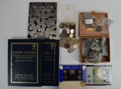 A large collection of USA 'Fifty State' commemorative quarter dollars in two folders and a 1999-2003