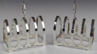 Pair of Elizabeth II hallmarked silver five bar toast racks, Birmingham 1960, maker William Suckling