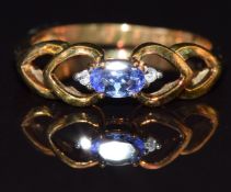 A 9k gold ring set with a tanzanite and diamonds, size M/N, 2.4g