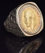 A 9ct gold ring set with a 1914 gold half sovereign, size Q, 12.4g