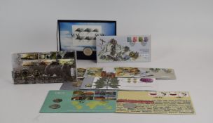 A collection of first day cover coin and stamp presentation packs including millennium, political,